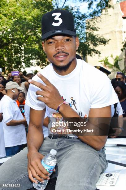 Chance The Rapper serves as Grand Marshal and donates 30,000 gift bags with school supplies at the 2017 Bud Billiken Parade on August 12, 2017 in...