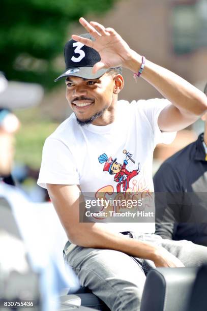 Chance The Rapper serves as Grand Marshal and donates 30,000 gift bags with school supplies at the 2017 Bud Billiken Parade on August 12, 2017 in...