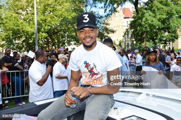 Chance The Rapper serves as Grand Marshal and donates 30,000 gift bags with school supplies at the 2017 Bud Billiken Parade on August 12, 2017 in...