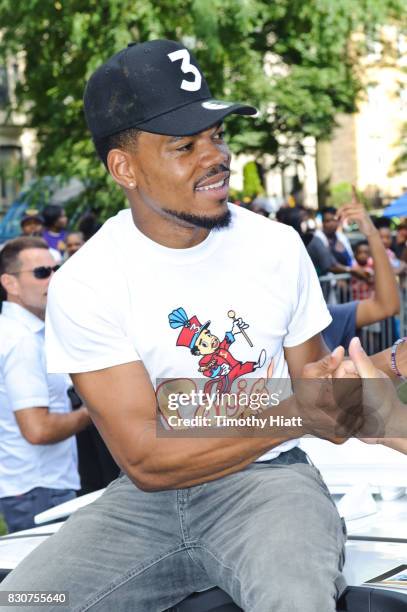 Chance The Rapper serves as Grand Marshal and donates 30,000 gift bags with school supplies at the 2017 Bud Billiken Parade on August 12, 2017 in...