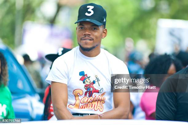 Chance The Rapper serves as Grand Marshal and donates 30,000 gift bags with school supplies at the 2017 Bud Billiken Parade on August 12, 2017 in...
