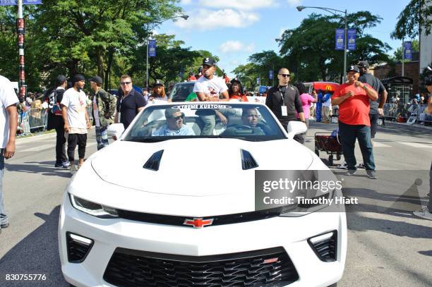 Chance The Rapper serves as Grand Marshal and donates 30,000 gift bags with school supplies at the 2017 Bud Billiken Parade on August 12, 2017 in...