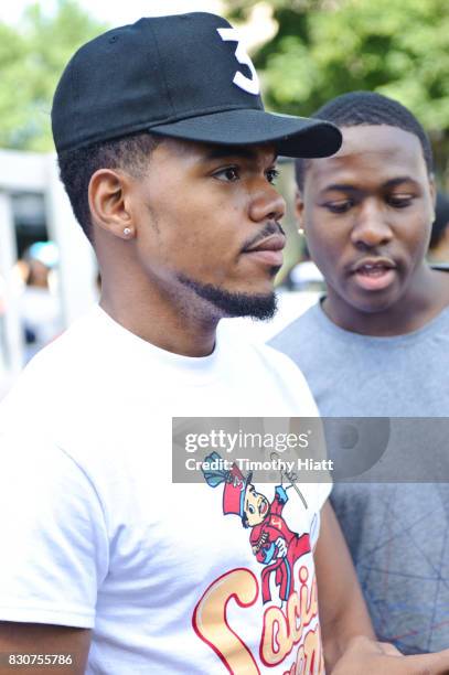 Chance The Rapper serves as Grand Marshal and donates 30,000 gift bags with school supplies at the 2017 Bud Billiken Parade on August 12, 2017 in...