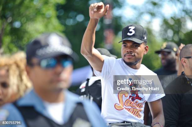 Chance The Rapper serves as Grand Marshal and donates 30,000 gift bags with school supplies at the 2017 Bud Billiken Parade on August 12, 2017 in...