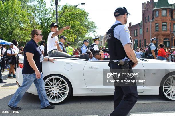 Chance The Rapper serves as Grand Marshal and donates 30,000 gift bags with school supplies at the 2017 Bud Billiken Parade on August 12, 2017 in...