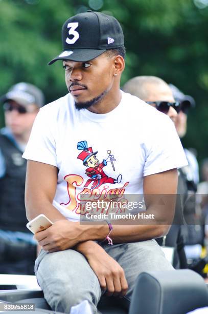 Chance The Rapper serves as Grand Marshal and donates 30,000 gift bags with school supplies at the 2017 Bud Billiken Parade on August 12, 2017 in...