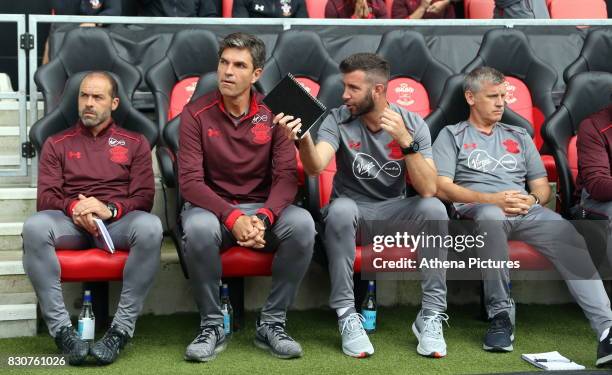 Southampton manager Mauricio Pellegrino with assistants in the dug out prior to the Premier League match between Southampton and Swansea City at the...