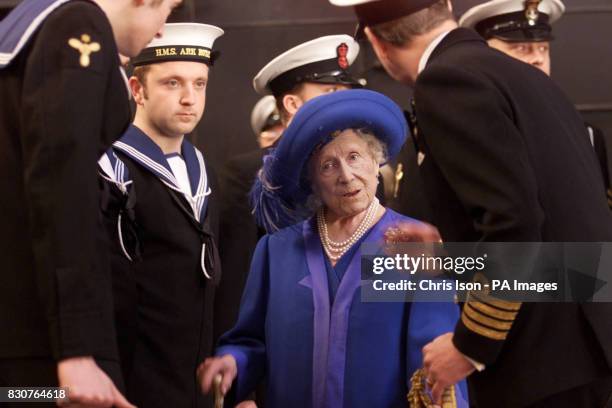 The Queen Mother meets officers and ratings on the Royal Navy aircraft carrier HMS Ark Royal moored in Portsmouth during a ceremony of rededication...