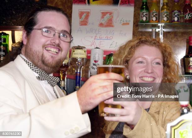 Gardener Charlie Dimmock buys Alan Stockdale, from Carlisle, a drink after he was named as Britain's Bingo Caller of the Year competiton held at the...