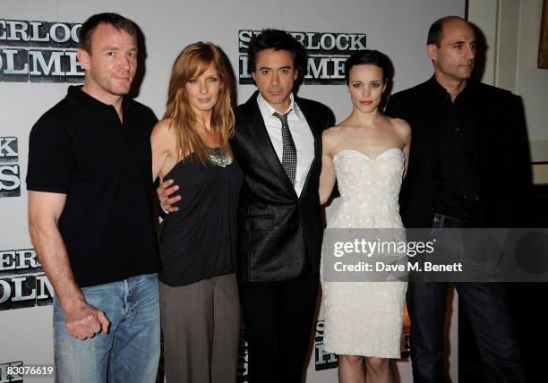 Guy Ritchie, Kelly Reilly, Robert Downey Jr, Rachel McAdams and Mark Strong pose during the 'Sherlock Holmes' pre-production press conference, at...