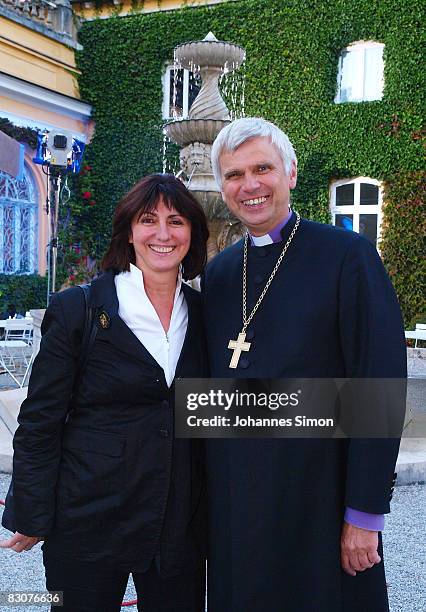 Johannes Friedrich , bishop and head of the Bavarian Evangelical Church, and his wife Dorothea arrive for the awarding ceremony of Iranian Nobel...