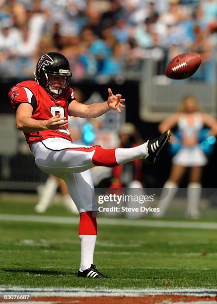 Punter Michael Koenen of the Atlanta Falcons gets off a punt in the first quarter of the game against the Carolina Panthers at Bank of America...