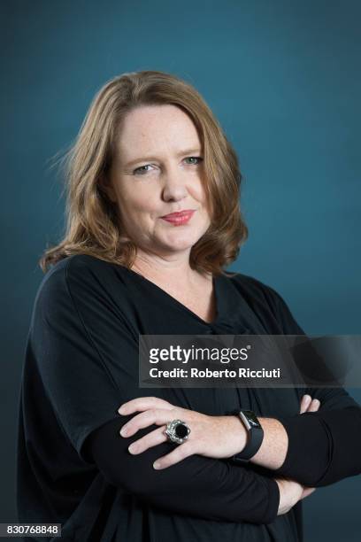 Zimbabwe-born British author Paula Hawkins attends a photocall during the annual Edinburgh International Book Festival at Charlotte Square Gardens on...
