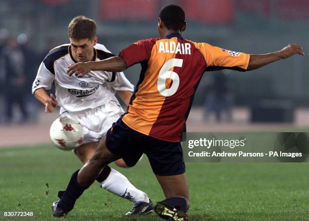 Liverpooll's Michael Owen attempts to by-pass Roma's Aldair during their UEFA Champions League match in Stadio Olimpico Rome. THIS PICTURE CAN ONLY...