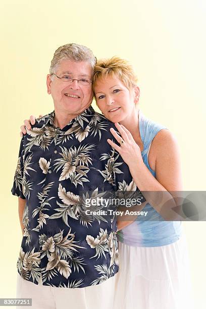woman with head resting on mans shoulder - troy bond stock pictures, royalty-free photos & images