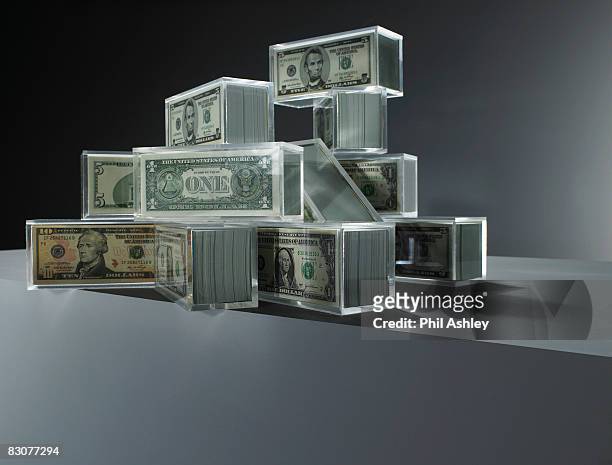 acrylic blocks with dollar notes inside - transparent box stock pictures, royalty-free photos & images