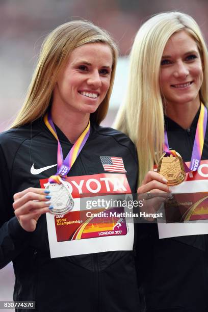 Courtney Frerichs of the United States, silver, and Emma Coburn of the United States, gold, pose with their medals for the Women's 3000 metres...