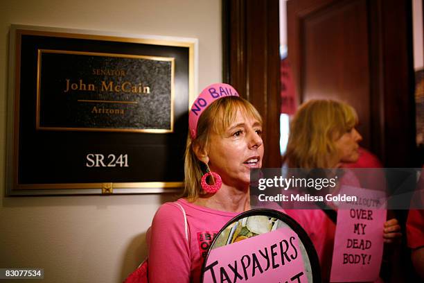 Code Pink co-founder Medea Benjamin and other members protests the government bailout of Wall Street outside Sen. John McCain's office October 1,...