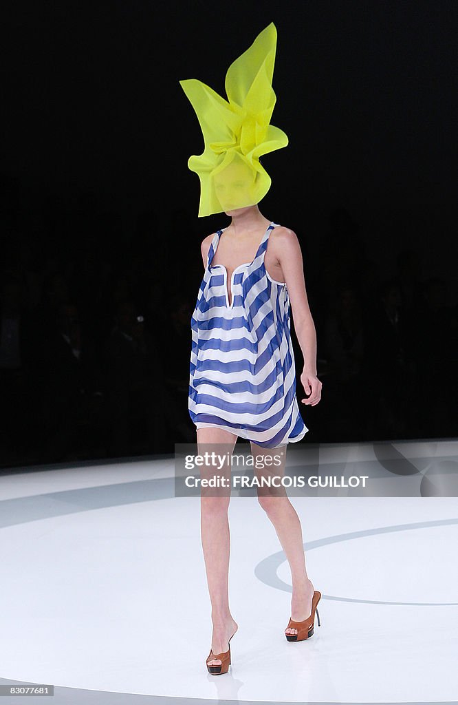 A model presents a creation by British-b