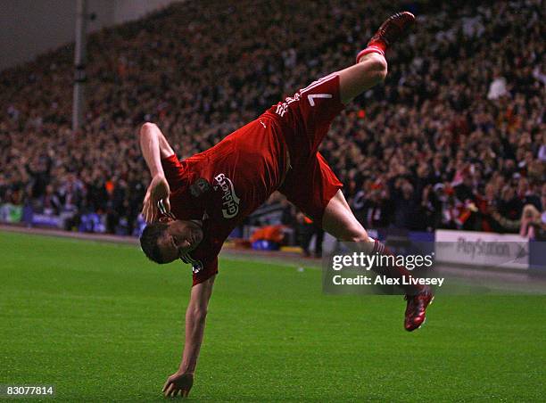 Robbie Keane of Liverpool celebrates scoring his team's second goal during the UEFA Champions League Group D match between Liverpool and PSV...