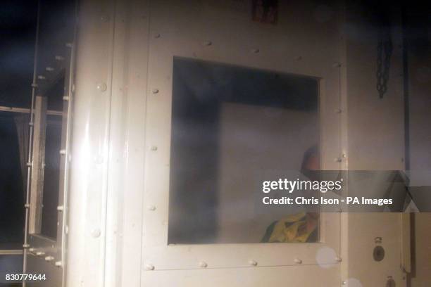 Roy Whiting inside a prison vehicle as it leaves Lewes Crown Court in East Sussex after he was found guilty of the abduction and murder of eight year...