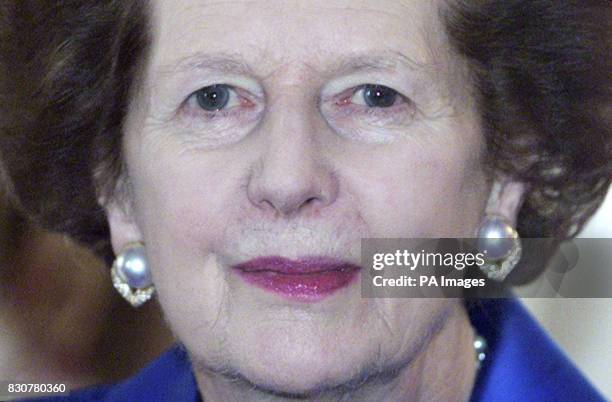 Former British Prime Minister Baroness Thatcher poses for a picture as she meets with President of Croatia Stjepan Mesic in London Tuesday December...