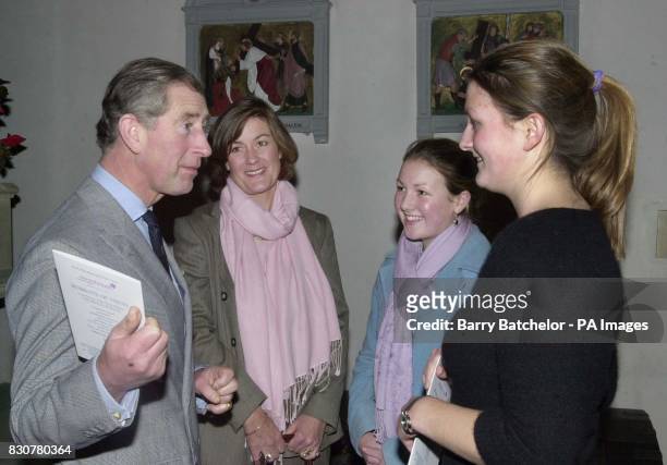 The Prince of Wales talks with from left Mrs Heather Saunders and daughters Catherine 15 and Nicola 16 after attending a Recital/Concert in Aid of...