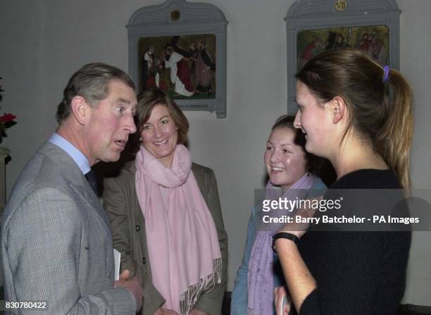 The Prince of Wales talks with from left Mrs Heather Saunders and daughters Catherine 15 and Nicola 16 after attending a Recital/Concert in Aid of...