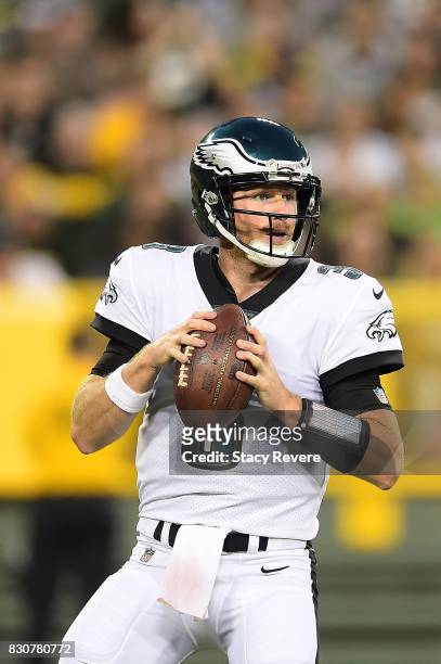Matt McGloin of the Philadelphia Eagles drops back to pass during a preseason game against the Green Bay Packers at Lambeau Field on August 10, 2017...