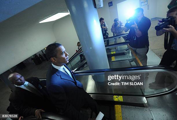 Senator and Democratic Presidential Candidate Barack Obama arrives inside the Capitol for a series of votes on the bailout plan on October 1, 2008 on...