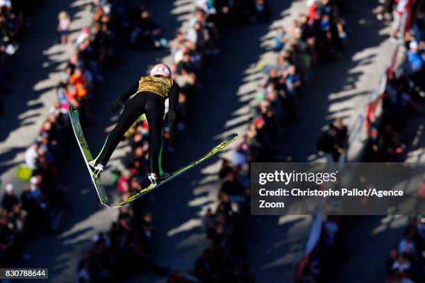 Dawid Kubacki of Poland takes 1st place during the Men's HS 132 at the FIS Grand Prix Ski Jumping on August 12, 2017 in Courchevel, France.