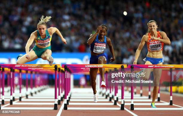 Sally Pearson of Australia, Kendra Harrison of the United States and Nadine Visser of the Netherlands compete in the Women's 100 metres hurdles final...