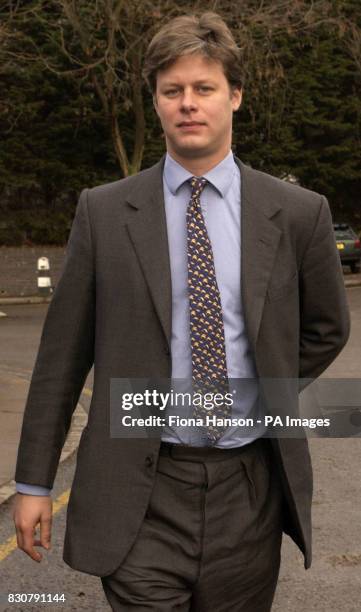 Peter Touche leaves St Pancras Coroner's Court in London, for the inquest into the death of his wife Laura who died after giving birth to twins. The...