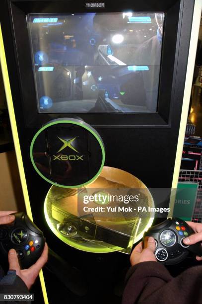 The eagerly awaited Microsoft XBOX games console on display at HMV's Oxford Street store in London's West End. The games console was delivered to the...