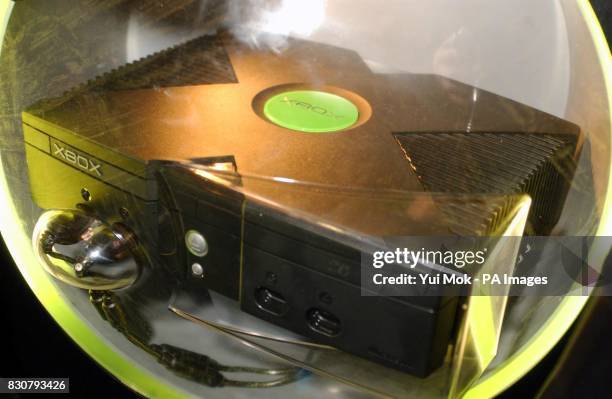 The eagerly awaited Microsoft XBOX games console on display at HMV's Oxford Street store in London's West End. The games console was delivered to the...