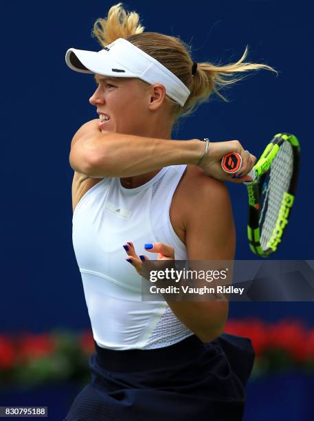 Caroline Wozniacki of Denmark plays a shot against Sloane Stephens of the United States during a semifinal match on Day 8 of the Rogers Cup at Aviva...