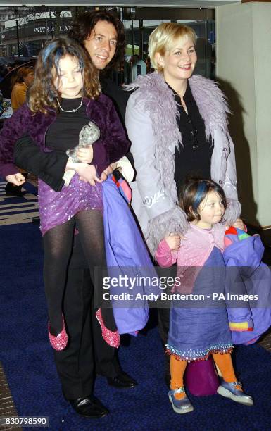Interior designer Laurence Llewelyn-Bowen, from the BBC TV programme 'Changing Rooms', with his wife Jackie and daughters arriving at the Gala film...