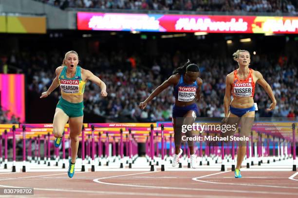 Sally Pearson of Australia, Kendra Harrison of the United States and Nadine Visser of Netherlands cross the finish line in the Women's 100 metres...