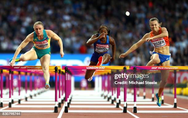 Sally Pearson of Australia, Kendra Harrison of the United States and Nadine Visser of Netherlands compete in the Women's 100 metres hurdles final...