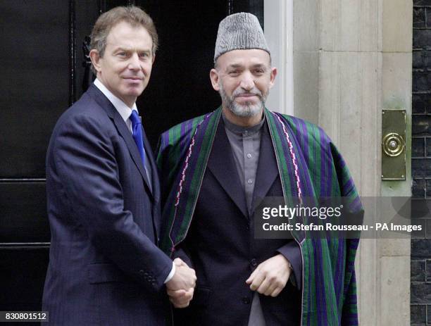 British Prime Minister Tony Blair meets Afghanistan's Interim Leader Hamid Karzai in Downing Street, London during a visit to Britain. Speaking in...