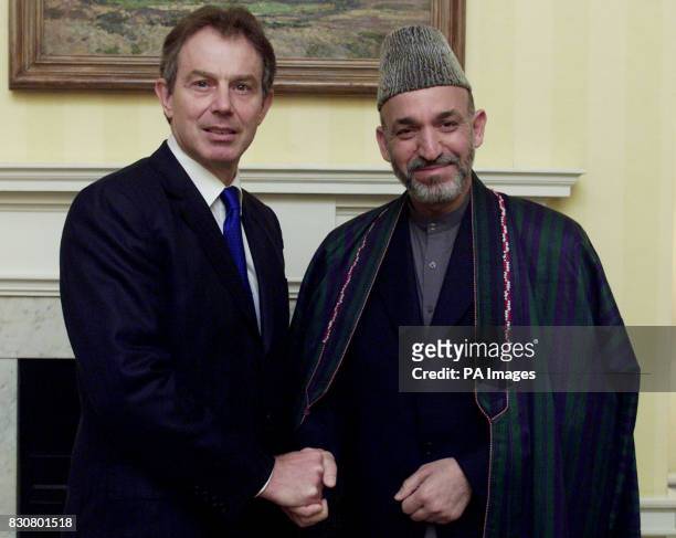 Britain's Prime Minister Tony Blair meets with the interim leader of Afghanistan Hamid Karzai in Downing Street in London Thurs day January 31, 2002.