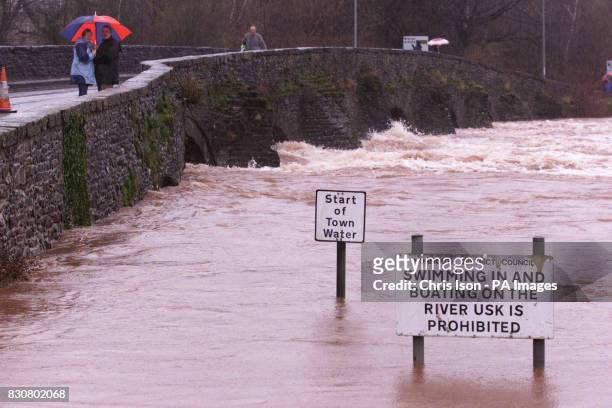 The River Usk which burst its banks and races through Abergavenny, Wales. The Environment Agency Wales confirmed three severe flooding warnings were...