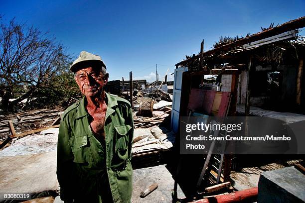 Rene Tejera Marino stands next to what is left of his house in the Playa Caletones community after Hurricane Ike tore through a week earlier,...