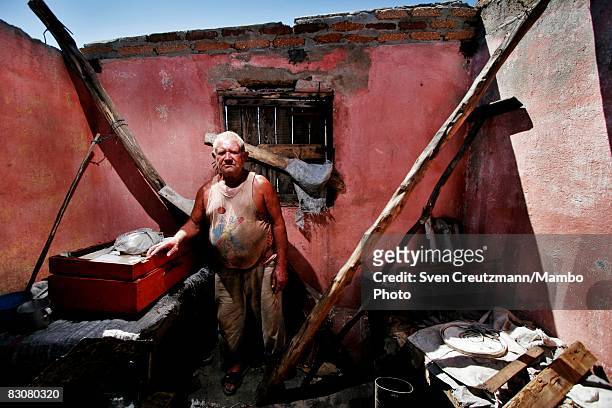 Marcelino Velazquez Valdez stands amid the ruins of his home after Hurricane Ike Ike tore through a week earlier, September 15 Gibara, Cuba. Cuba...