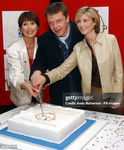 Anita Harris , former Madness front man Suggs and TV presenter Julia Carling cut a birthday cake in aid of Great Ormond Street Hospital at the...