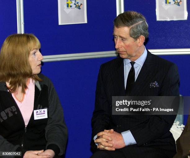 The Prince of Wales speaking to Karen McGrane, a client at the Merchants Quay Drop-In Centre, for drug addicts and homeless people in the centre of...