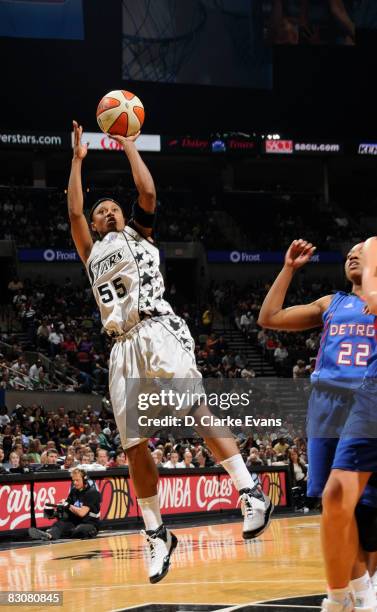 Vickie Johnson of the San Antonio Silver Stars shoots against Alexis Hombuckle of the Detroit Shock in Game One of the WNBA Finals on October 1, 2008...