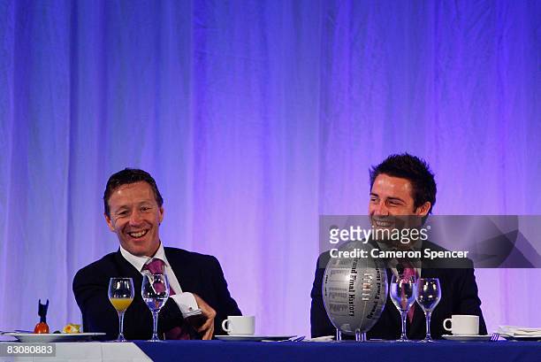 Storm coach Craig Bellamy and captain Cooper Cronk laugh during the 2008 NRL Grand Final breakfast at the Westin hotel on October 2, 2008 in Sydney,...