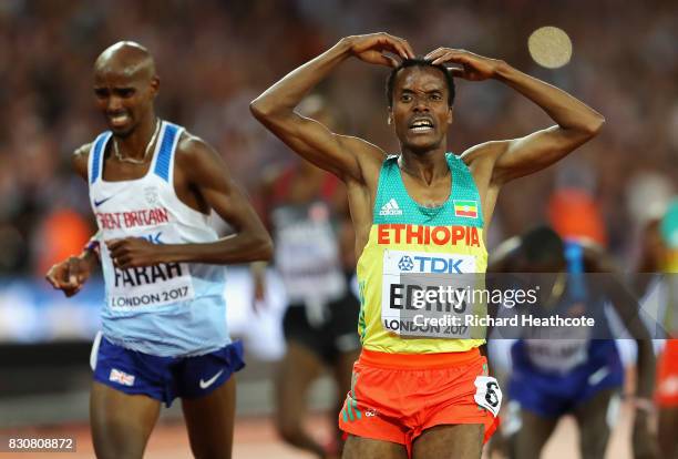 Muktar Edris of Ethiopia does the "Mobot" as Mohamed Farah of Great Britain looks on after crossing the finishline in the Men's 5000 Metres final...