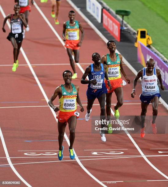 Muktar Edris of Ethiopia celebrates as he crosses the finish line ahead of Mohamed Farah of Great Britain, Yomif Kejelcha of Ethiopia and Paul...